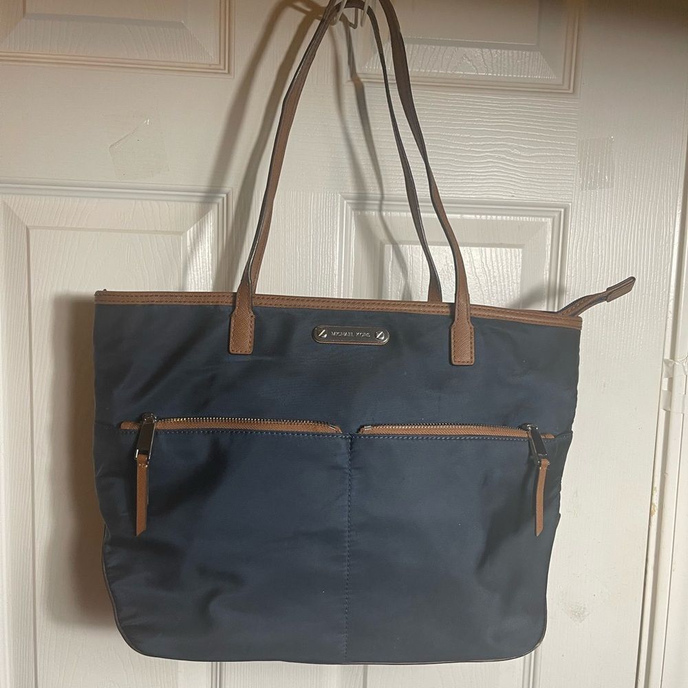 Michael Kors  Nylon Navy Blue Tote with leather Brown Trim and straps ..